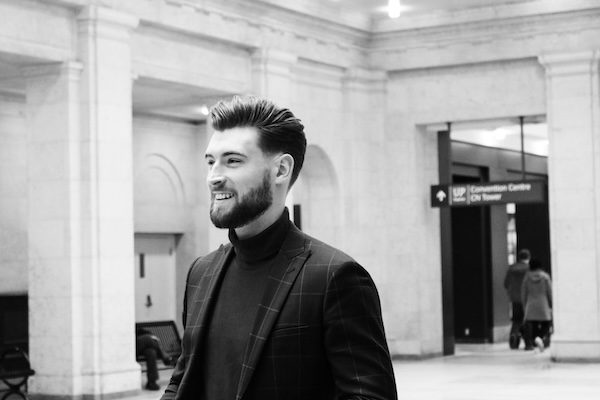 Bearded man with a nice haircut.