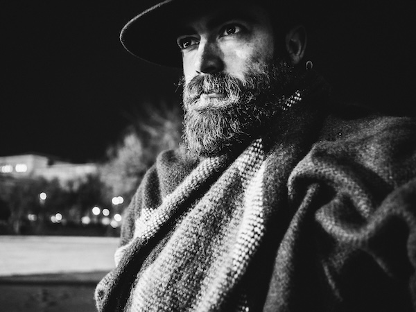 Man wearing a hat with a beard