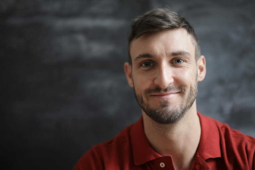 man in red polo shirt