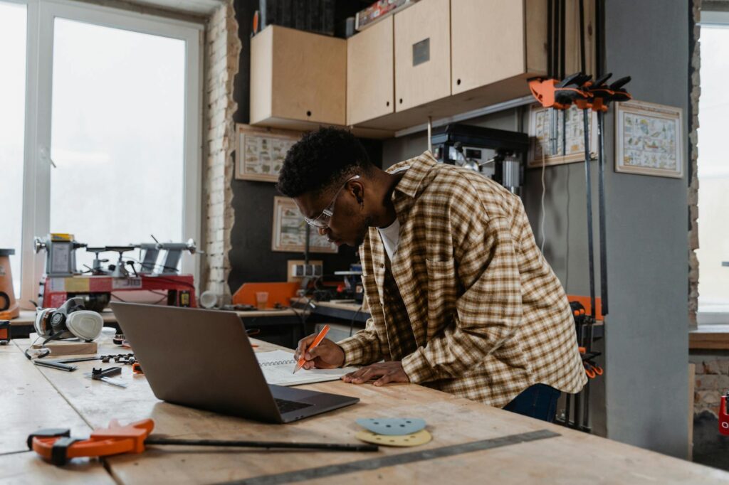 a man doing a woodwork