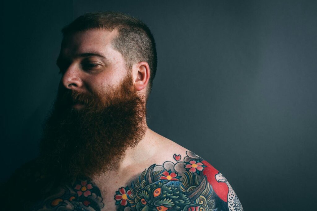 man with body tattoo